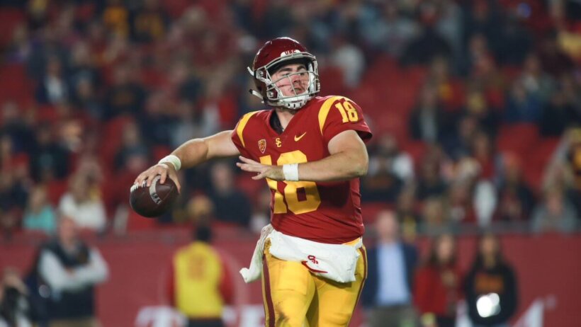 USC quarterback JT Daniels prepares to snap a pass