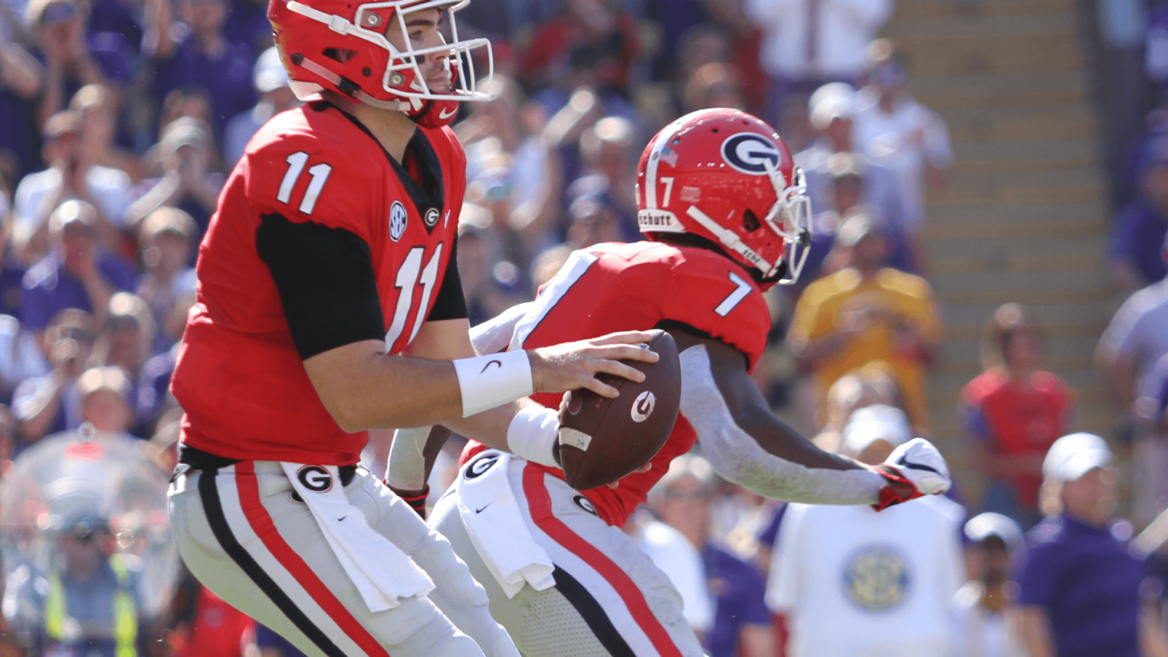 Jake Fromm taking a snap out of shotgun