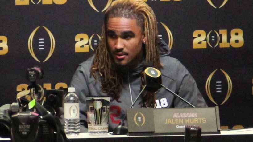 Jalen Hurts taking questions during a press conference.