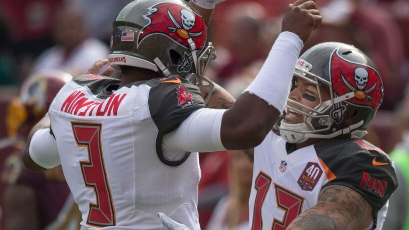 James Winston and Mike Evans celebrating