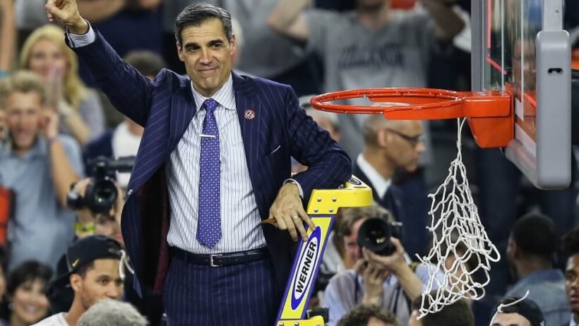 Villanova coach Jay Wright cutting down the nets.