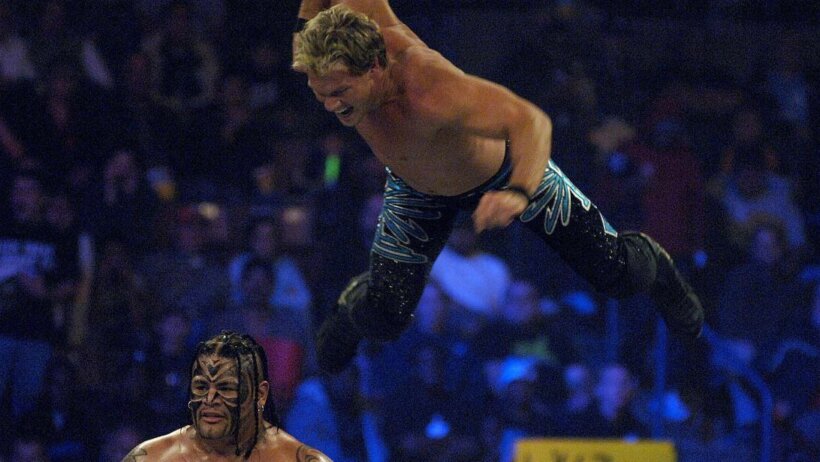Chris Jericho flying off the top rope.