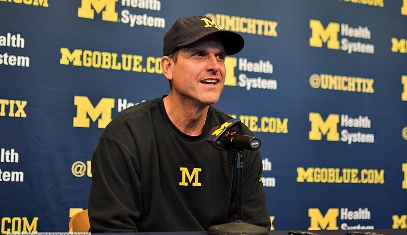 Jim Harbaugh at a press conference