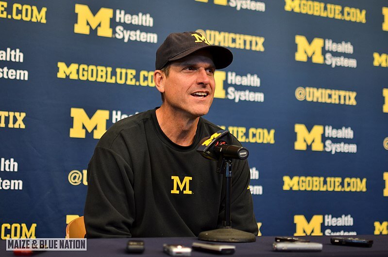 Jim Harbaugh at a press conference