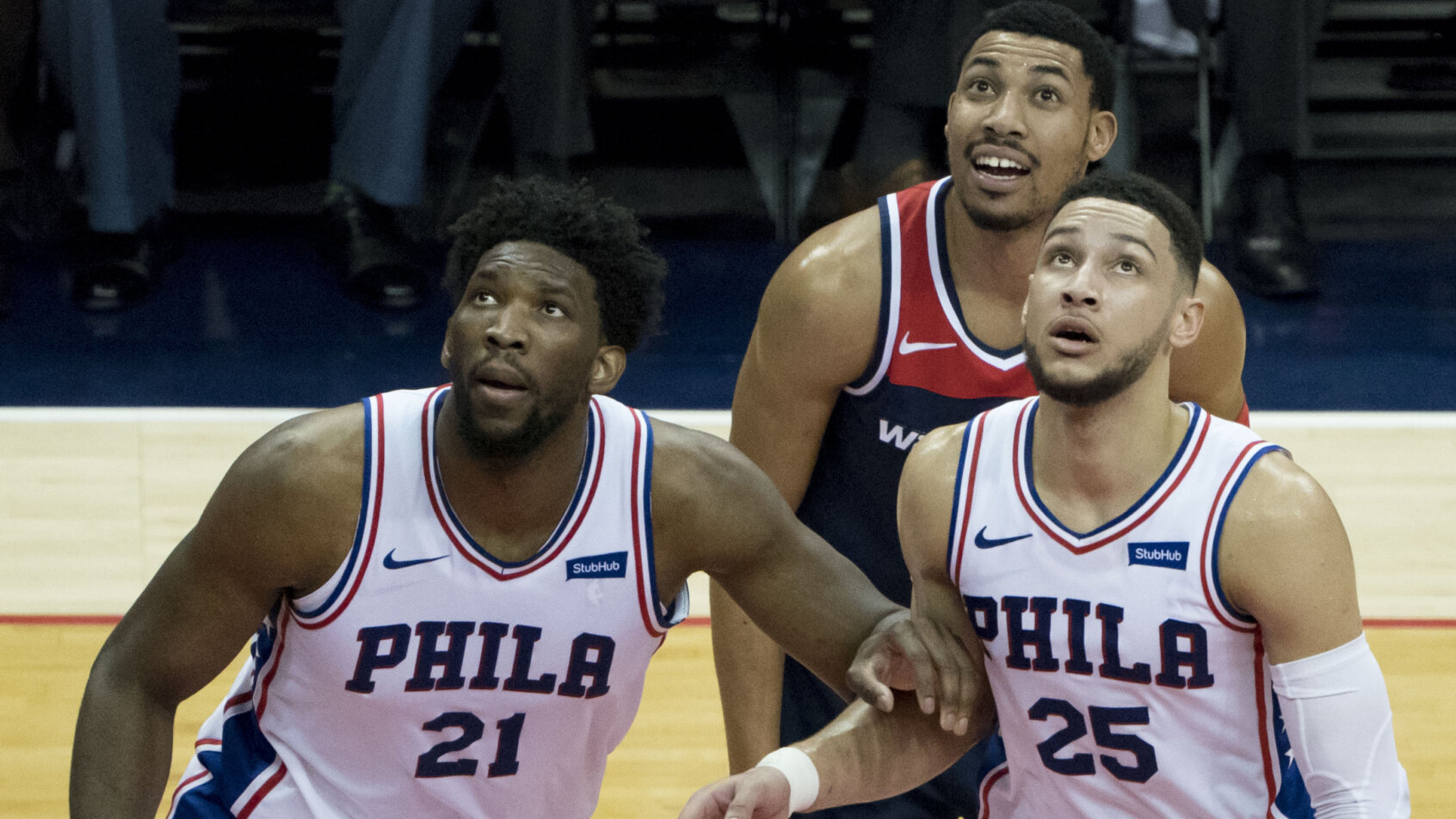 Joel Embiid going for a rebound.