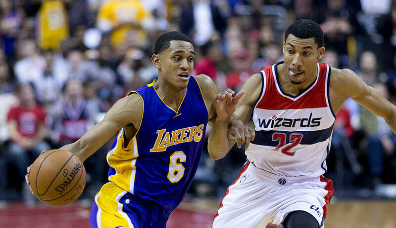 Jordan Clarkson drives to the hoop against Otto Porter Jr.