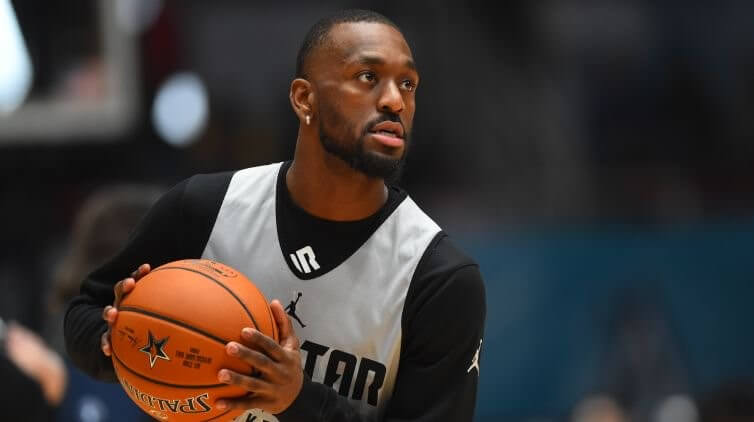 Kemba Walker holding a basketball