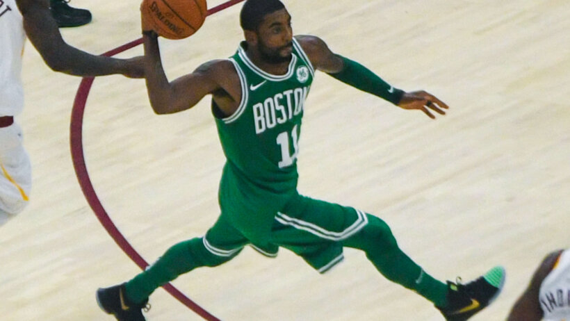 Kyrie Irving of the Boston Celtics making a pass.