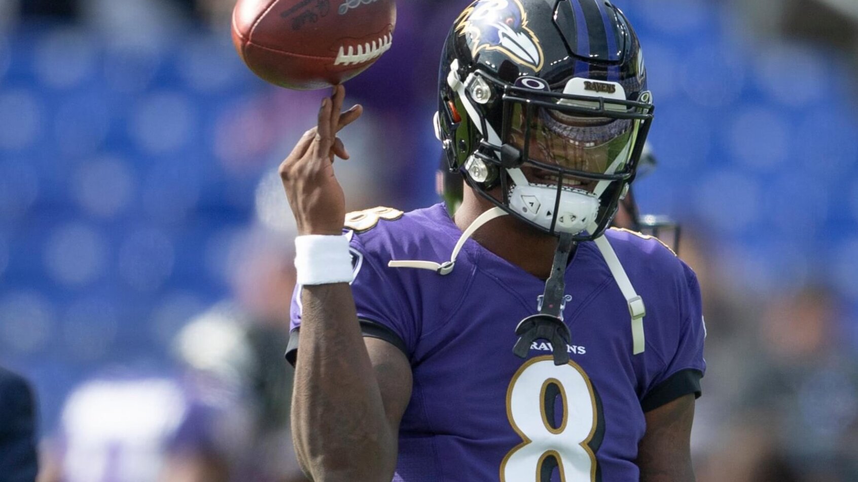 Lamar Jackson spinning a football
