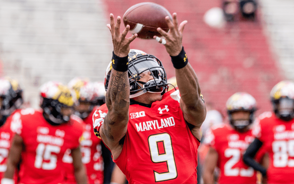 A receiver making a catch at a Maryland football practice.