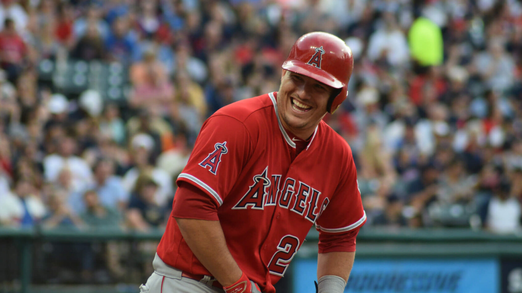 Mike Trout laughing on the base path.