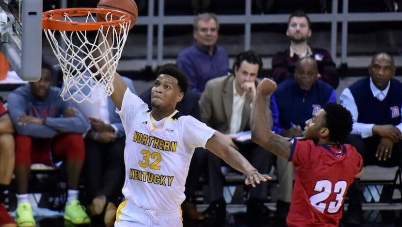 NKU forward Drew McDonald dunking.