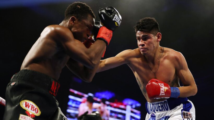 Emanuel Navarrete throwing a jab