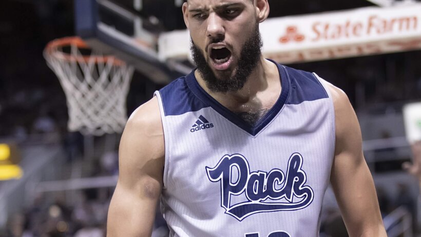 Nevada forward Caleb Martin celebrating a basket.