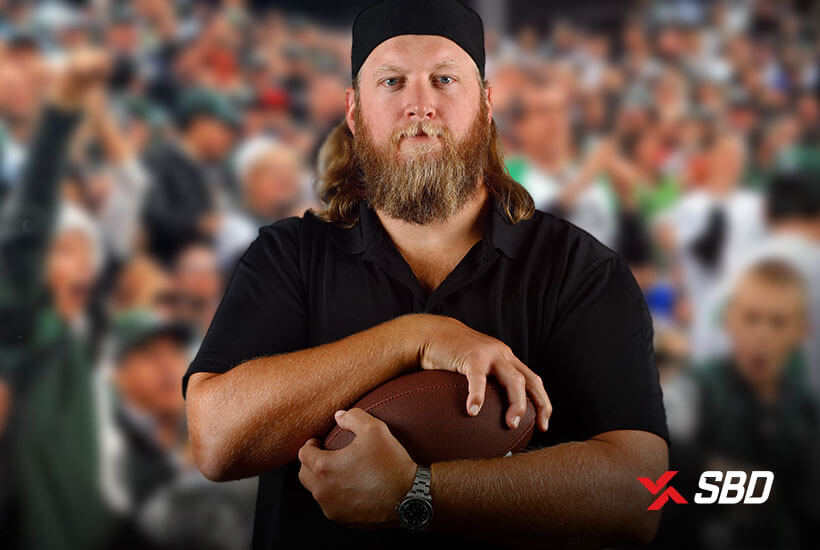 Nick Mangold holding football