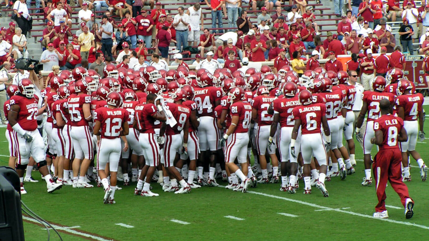 The Oklahoma Sooners in a team huddle