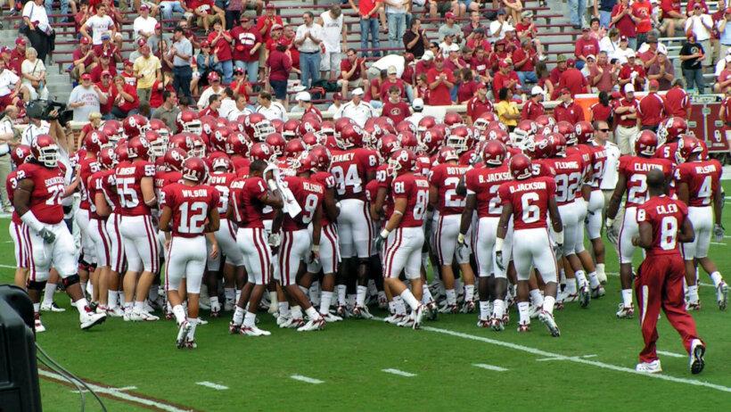 The Oklahoma Sooners in a team huddle