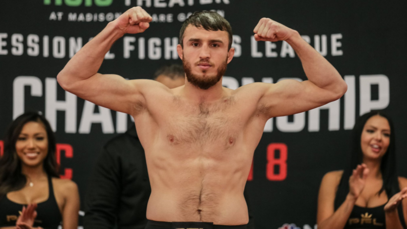 Magomed Magomedkerimov poses during his weigh-in.