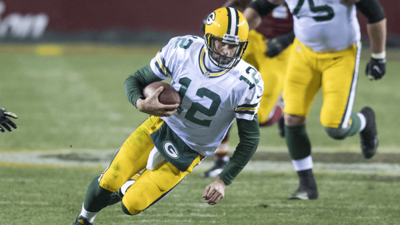 Packers QB Aaron Rodgers sliding to the ground.