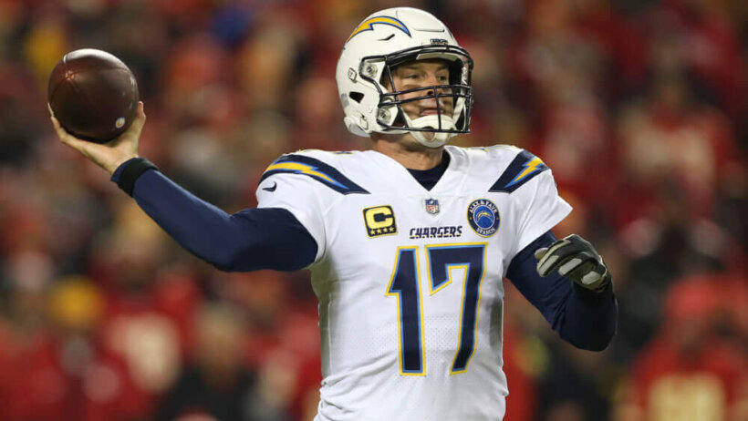 Philip Rivers about to pass the football.
