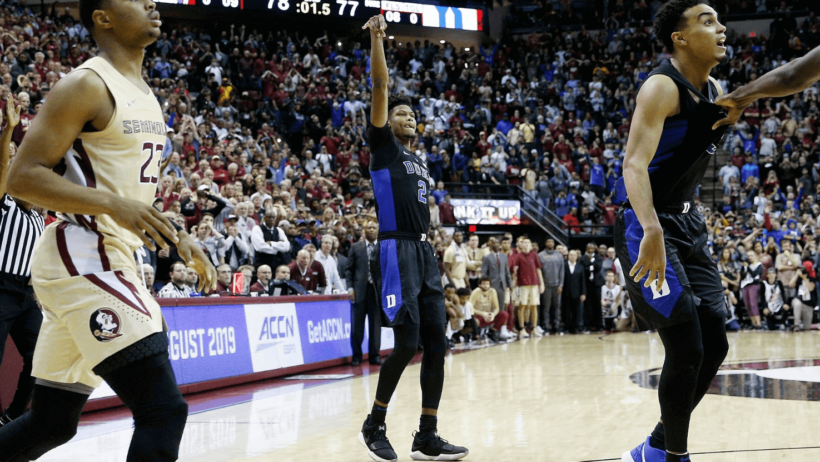 Cam Reddish shooting a three.