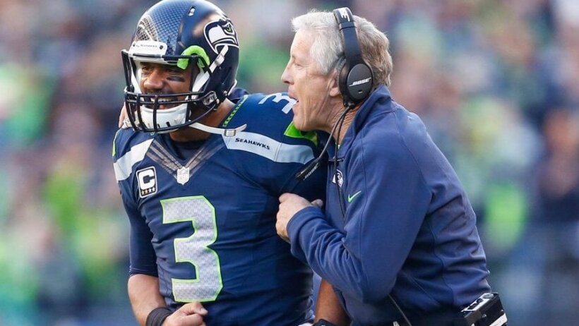 Russell Wilson and Pete Carroll celebrating