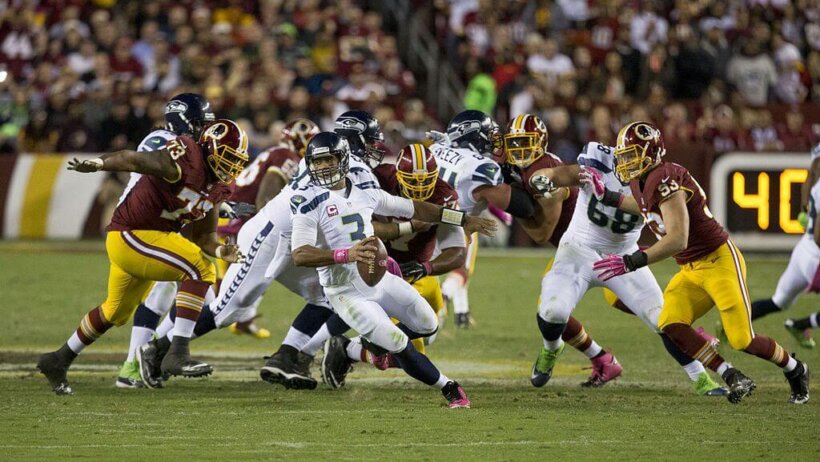 Russell Wilson bailing out of the pocket