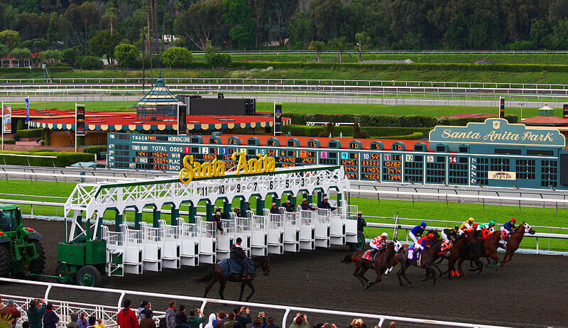 Horses leave the gate at Santa Anita Racetrack.