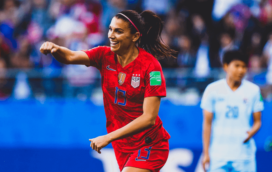 Alex Morgan celebrates.