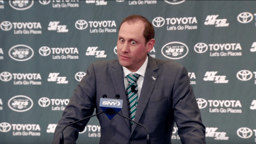 Adam Gase making odd faces at the podium