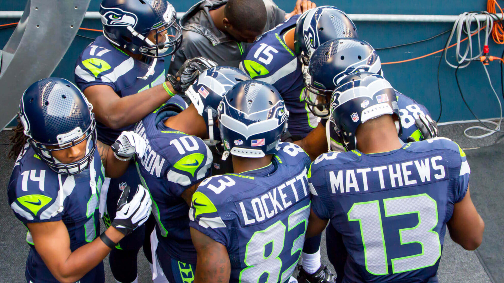 Seattle Seahawks huddling