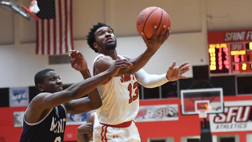 St Francis PA guard Keith Braxton laying the ball in the hoop.