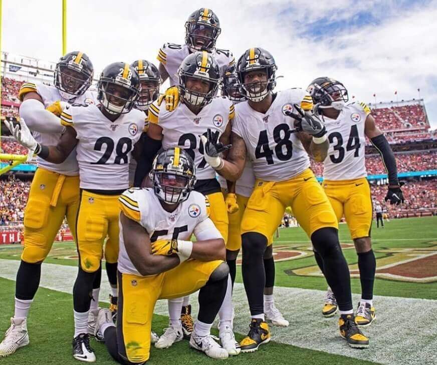 Steelers defense celebrating a return TD