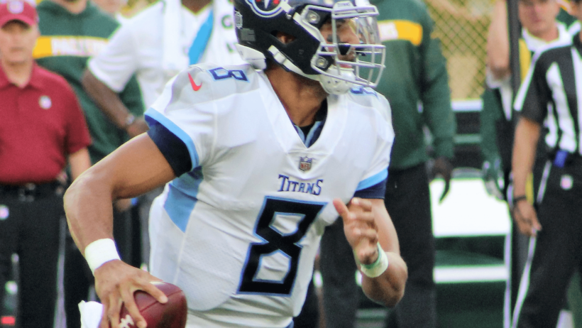 Titans QB Marcus Mariota on the move in the pocket.
