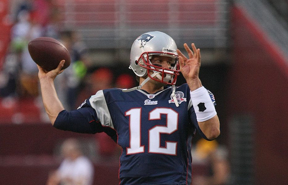 Tom Brady of the New England Patriots throwing the ball