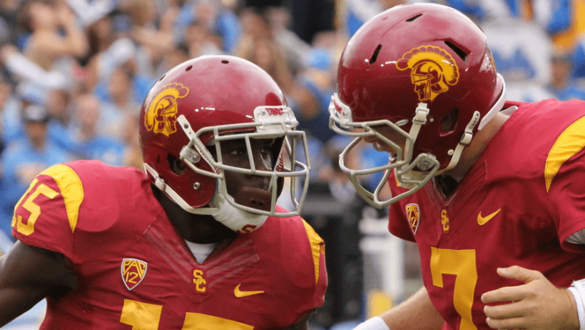 USC football players celebrate a TD