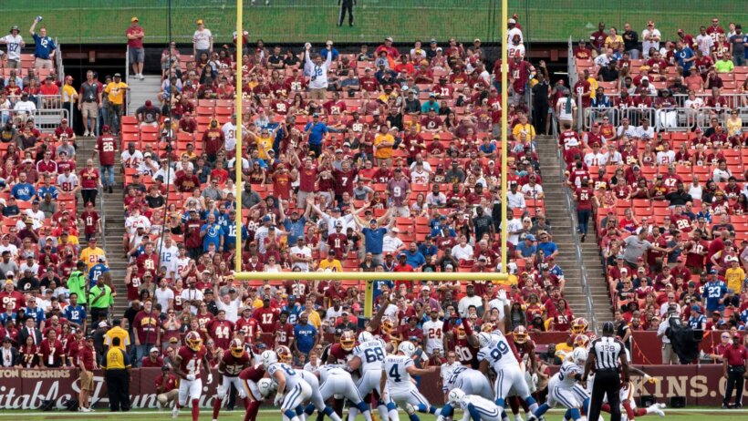 Adam Vinatieri kicks a field goal