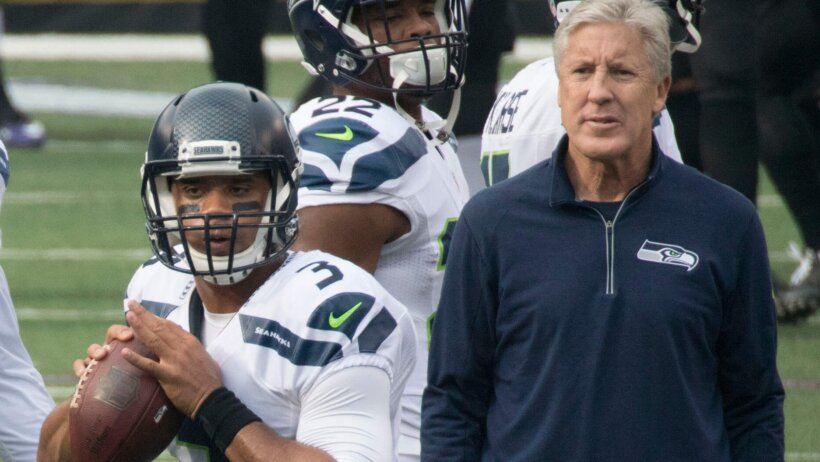 Pete Carroll and Russell Wilson before a game