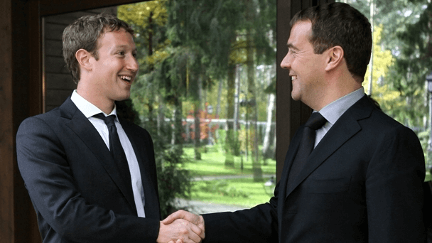Mark Zuckerberg shaking hands with Dmitry Medvedev
