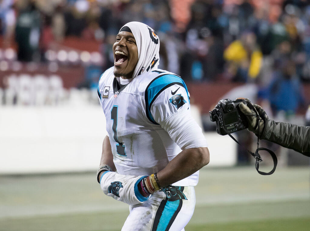 Cam Newton running off the field.