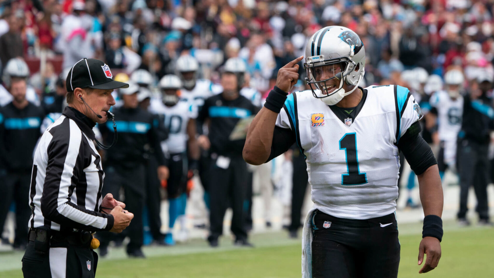 Cam Newton talking to the referee