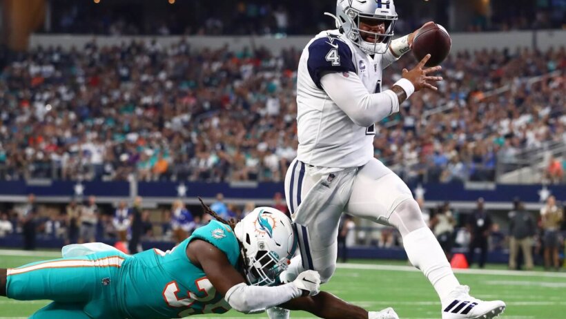 Dak Prescott running for a TD