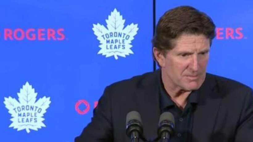 Mike Babcock at the podium