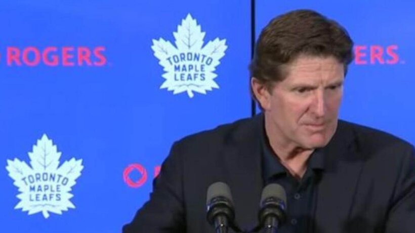 Mike Babcock at the podium