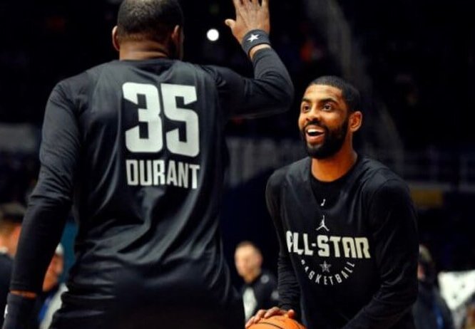 Kyrie Irving warming up with Kevin Durant