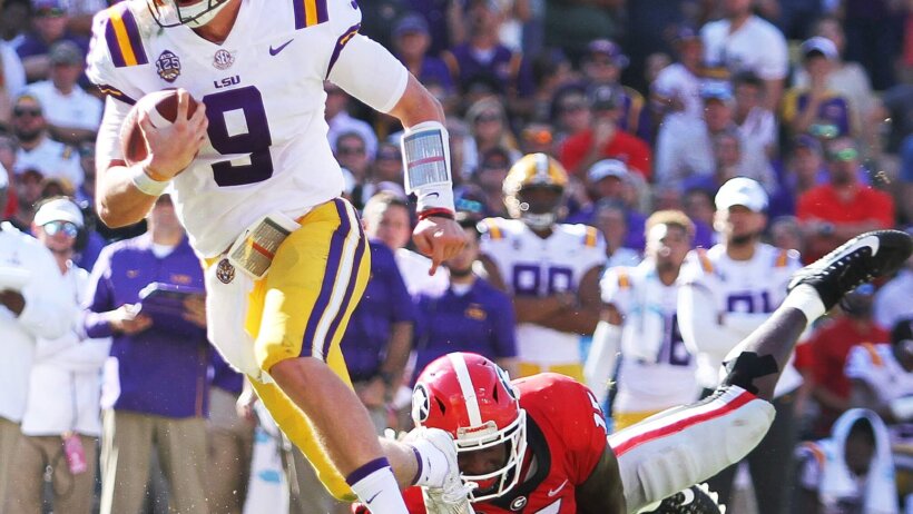 Joe Burrow running the ball for LSU