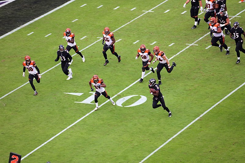 Lamar Jackson running towards the end zone.