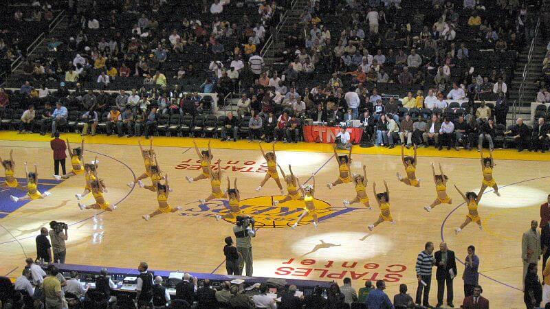 Lakers cheerleaders on the court.