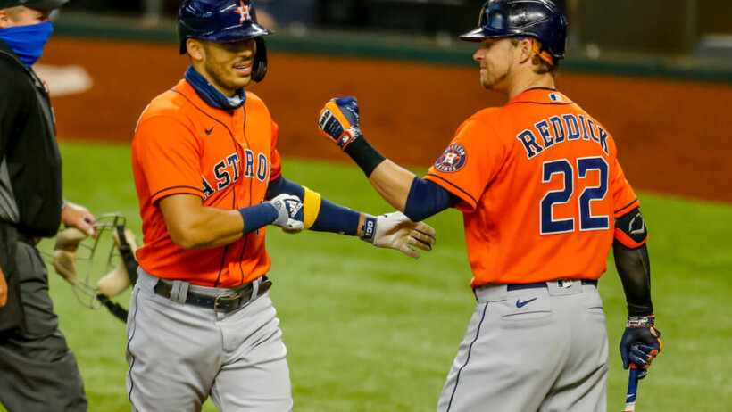 Carlos Correa and Josh Reddick celebrating a home run