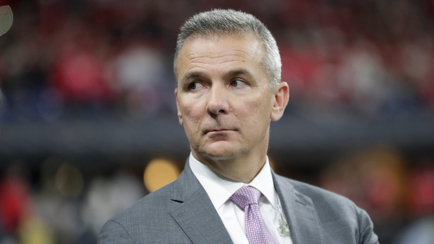 Urban Meyer sitting